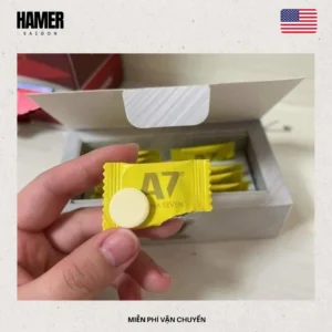 Mỗi viên kẹo sâm A7 Alpha Seven chính hãng được thiết kế dạng viên ngậm hình tròn màu vàng chanh.